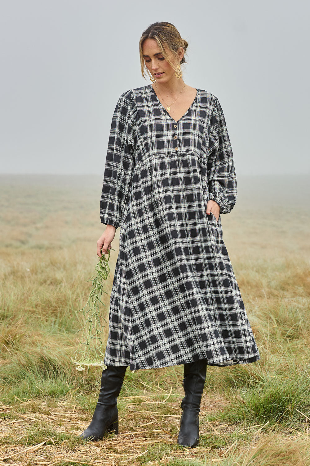 Model Tegan wearing size 10 of the Ready For A Picnic Smock Dress in colour Blkcheck (Black), from the front, showing the whole outfit