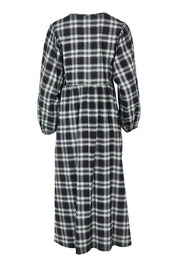 Product shot of the Ready For A Picnic Smock Dress in colour Blkcheck (Black), from the back