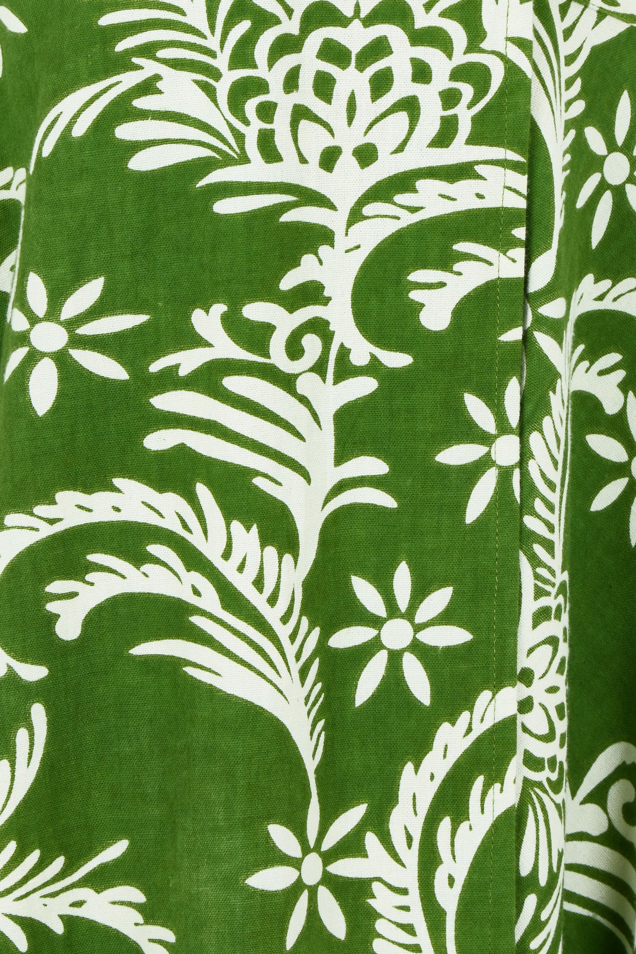 Product shot of the Double Take Wrap Dress in colour Grnfleur (Green), detail