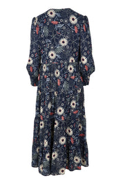Product shot of the Falling Flowers Maxi Dress in colour Navyfleur (Blue), from the back