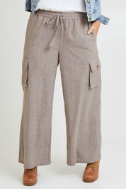 Model Laura wearing size 14 of the Living Life Cargo Pants in colour Bark, from the front, cropped image