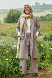 Model Tegan wearing size 10 of the Living Life Slouch Jacket in colour Bark, from the front, showing the whole outfit