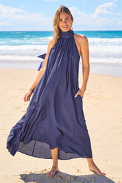 Model Tegan wearing size 10 of the Dream Daze Cotton Maxi Dress in colour Deepblue (Blue), from the front, showing the whole outfit