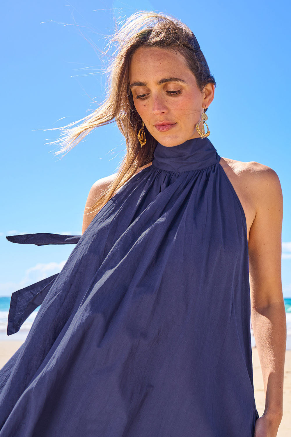 Model Tegan wearing size 10 of the Dream Daze Cotton Maxi Dress in colour Deepblue (Blue), from the front, showing the whole outfit