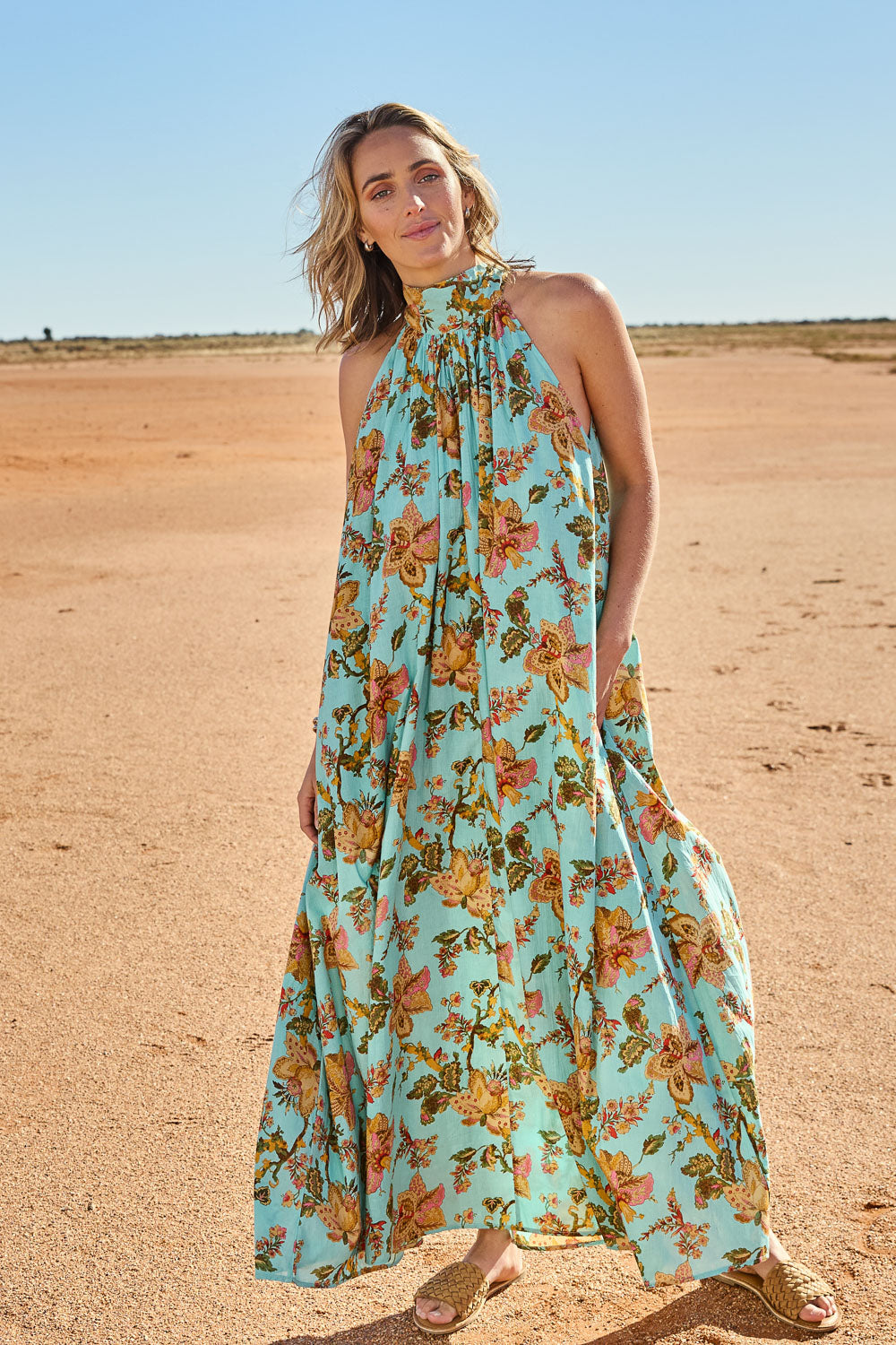 Model Tegan wearing size 10 of the Dream Daze Cotton Maxi Dress in colour Sky (Blue), from the front, showing the whole outfit