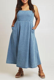Model Ashleigh wearing size 16 of the For All Seasons Denim Dress in colour Denim (Blue), from the front, cropped image