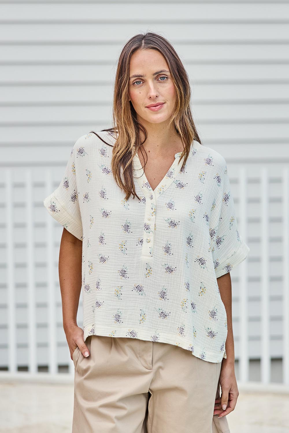Model Tegand wearing size 10 of the Grandpa And Me Fleur Cotton Top – Creamfleur in colour Creamfleur, in a cropped view