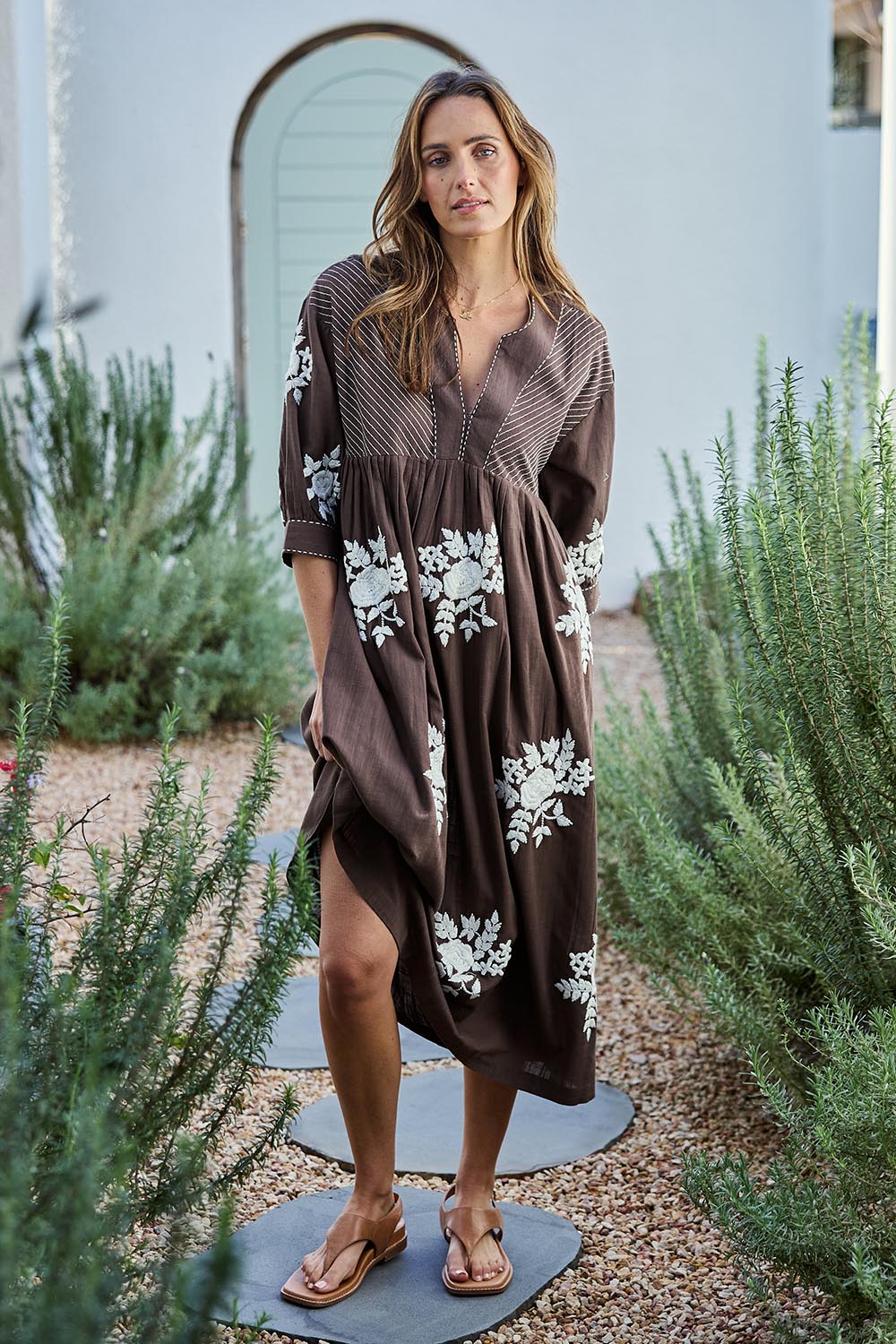 Model Tegand wearing size 10 of the Day Dreaming Embroidered Dress – Dustychoc in colour Dustychoc, from the front
