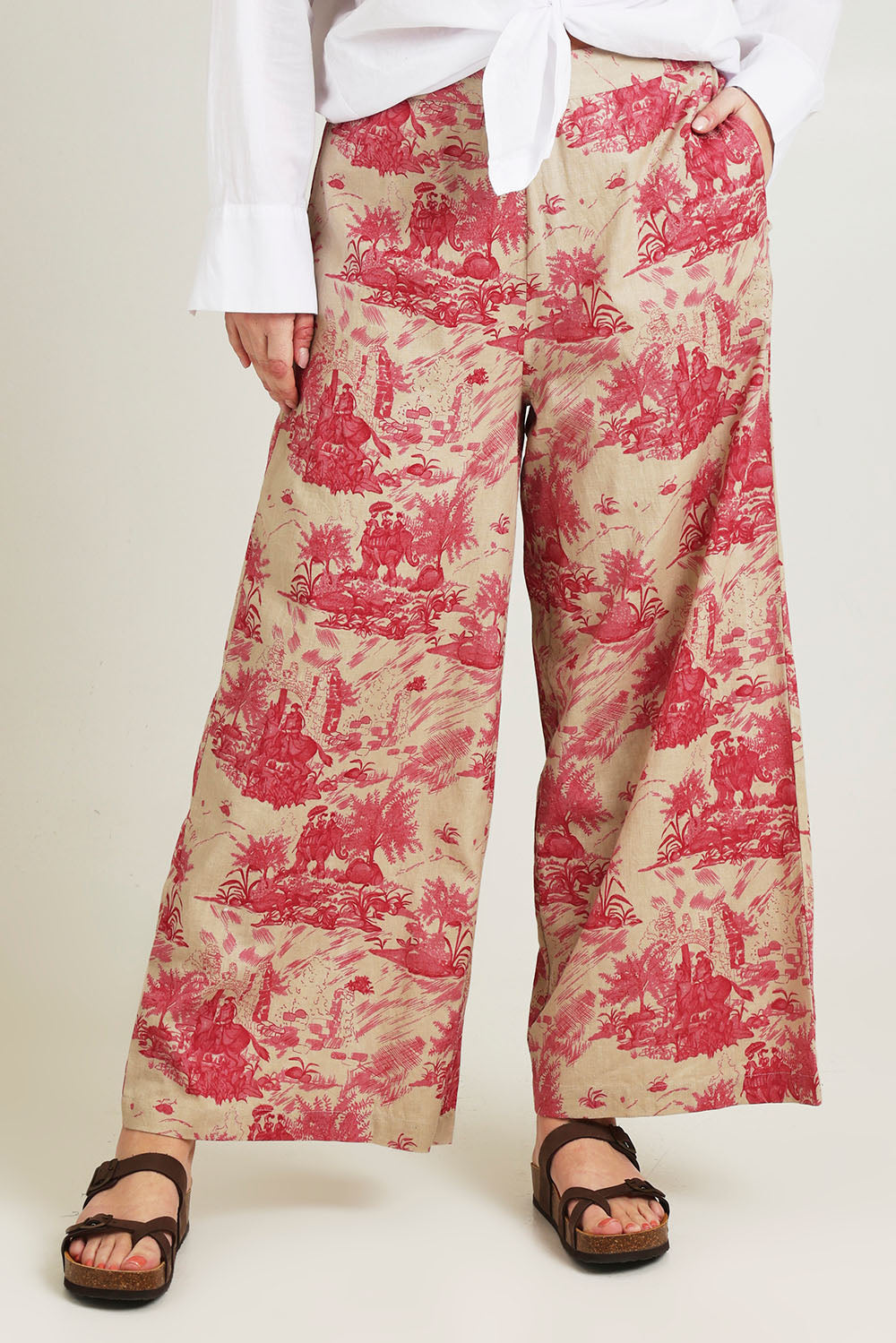 Model Jane wearing size 14 of the Toile De Jouy Pants in colour Pinktoile (Pink), from the front, cropped image