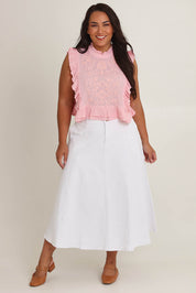 Model Ashleigh wearing size 16 of the Easy Frills Embroidered Top in colour Blossom (Pink), from the front, showing the whole outfit