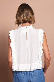 Model Riina wearing size 10 of the Easy Frills Embroidered Top in colour Milk (White), from the back