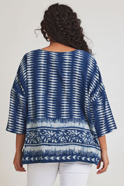 Model Terri-Leigh wearing size L of the True Delight Kota Doria Top in colour Indigo (Blue), from the back