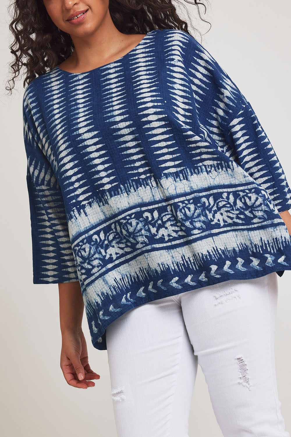 Model Terri-Leigh wearing size L of the True Delight Kota Doria Top in colour Indigo (Blue), from the front, cropped image