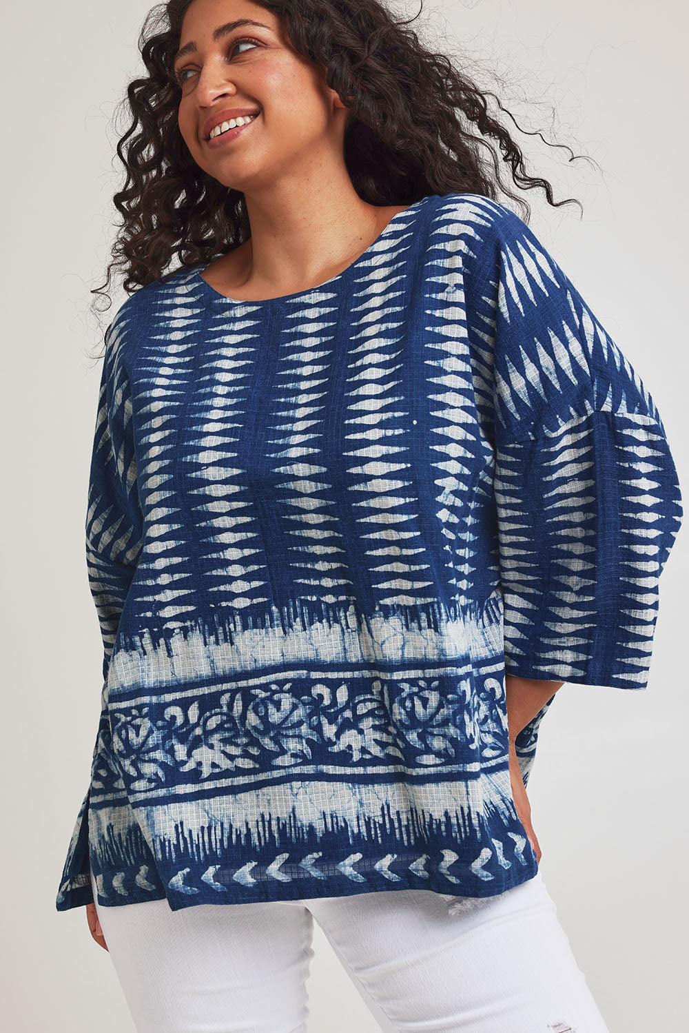 Model Terri-Leigh wearing size L of the True Delight Kota Doria Top in colour Indigo (Blue), from the front, cropped image