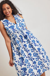 Model Terri-Leigh wearing size 14 of the Always A Pleasure Dress in colour Bluefleur (Blue), from the front, cropped image
