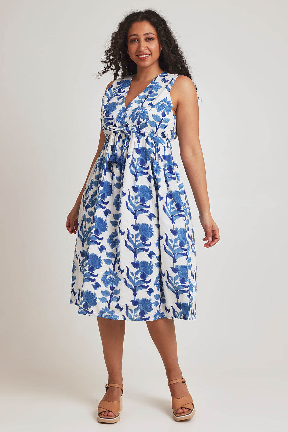 Model Terri-Leigh wearing size 14 of the Always A Pleasure Dress in colour Bluefleur (Blue), from the front, showing the whole outfit