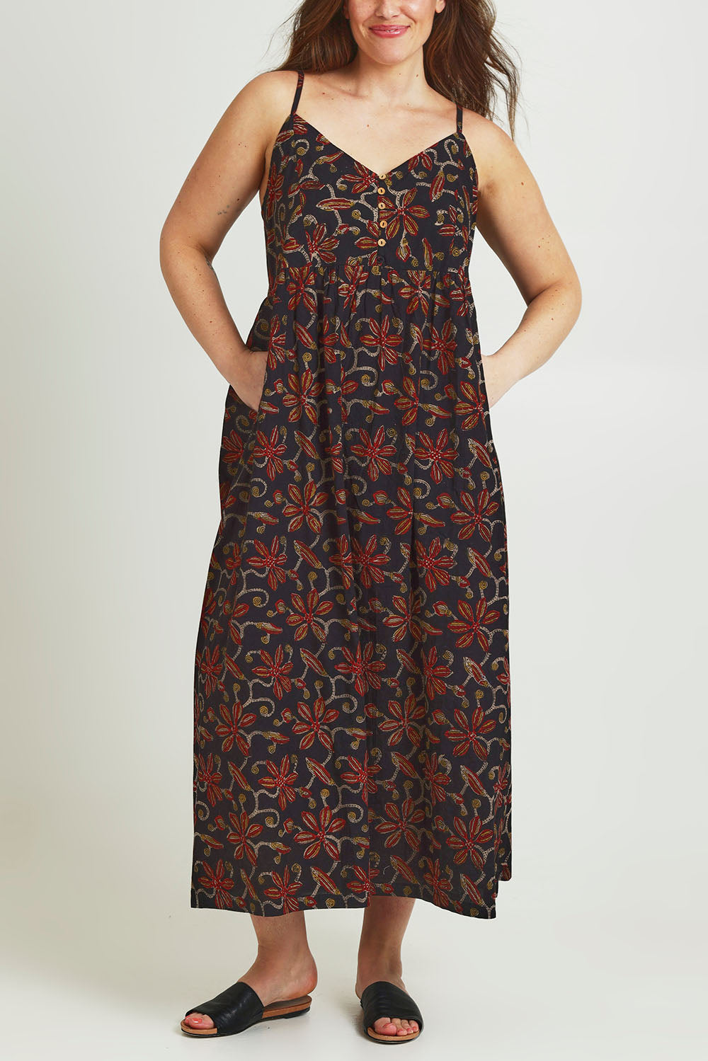 Model Jane wearing size 14 of the At Sunset Maxi Dress in colour Midnight (Black), from the front, cropped image