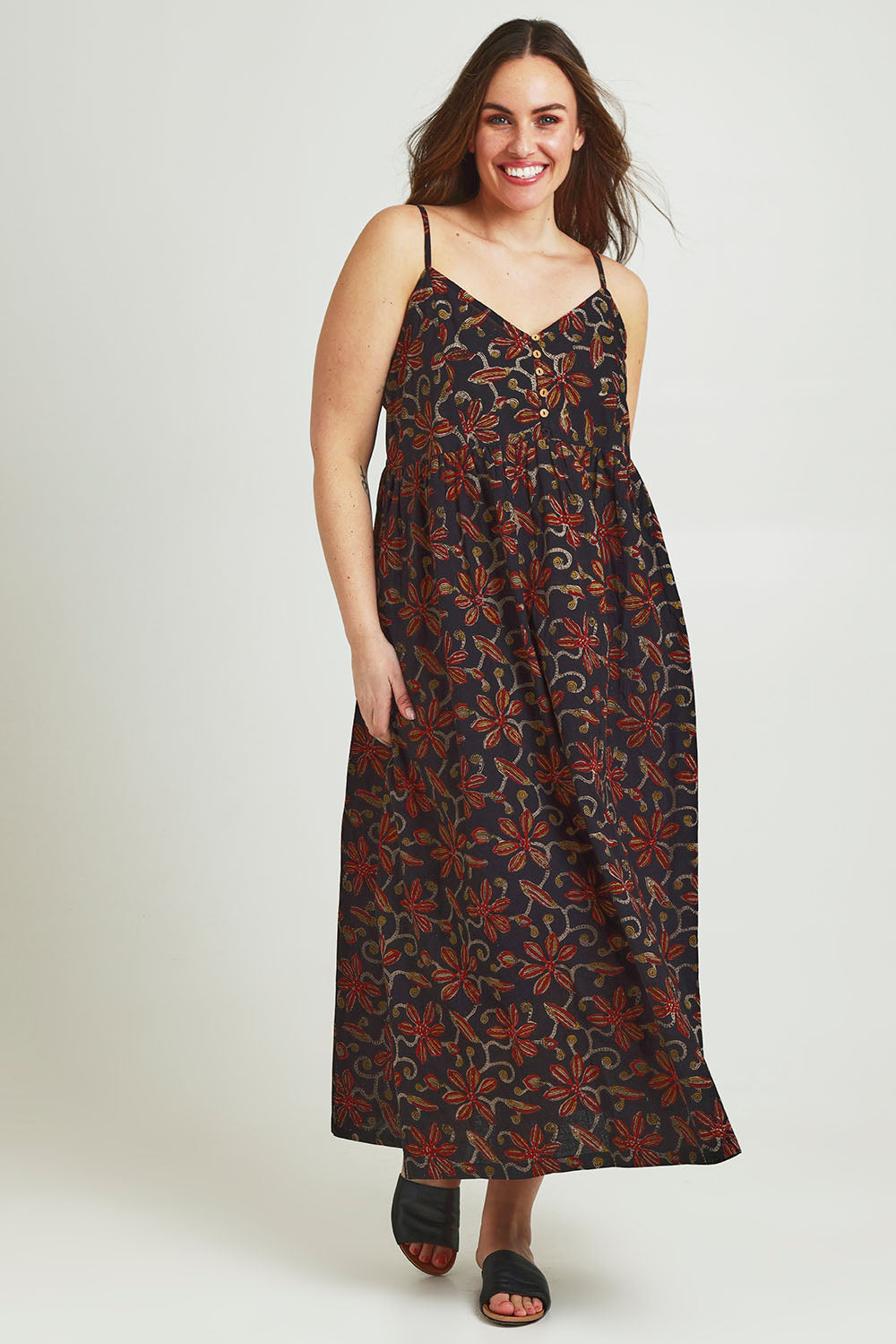 Model Jane wearing size 14 of the At Sunset Maxi Dress in colour Midnight (Black), from the front, showing the whole outfit