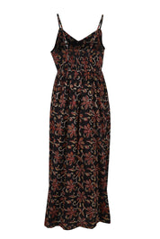 Product shot of the At Sunset Maxi Dress in colour Midnight (Black), from the back