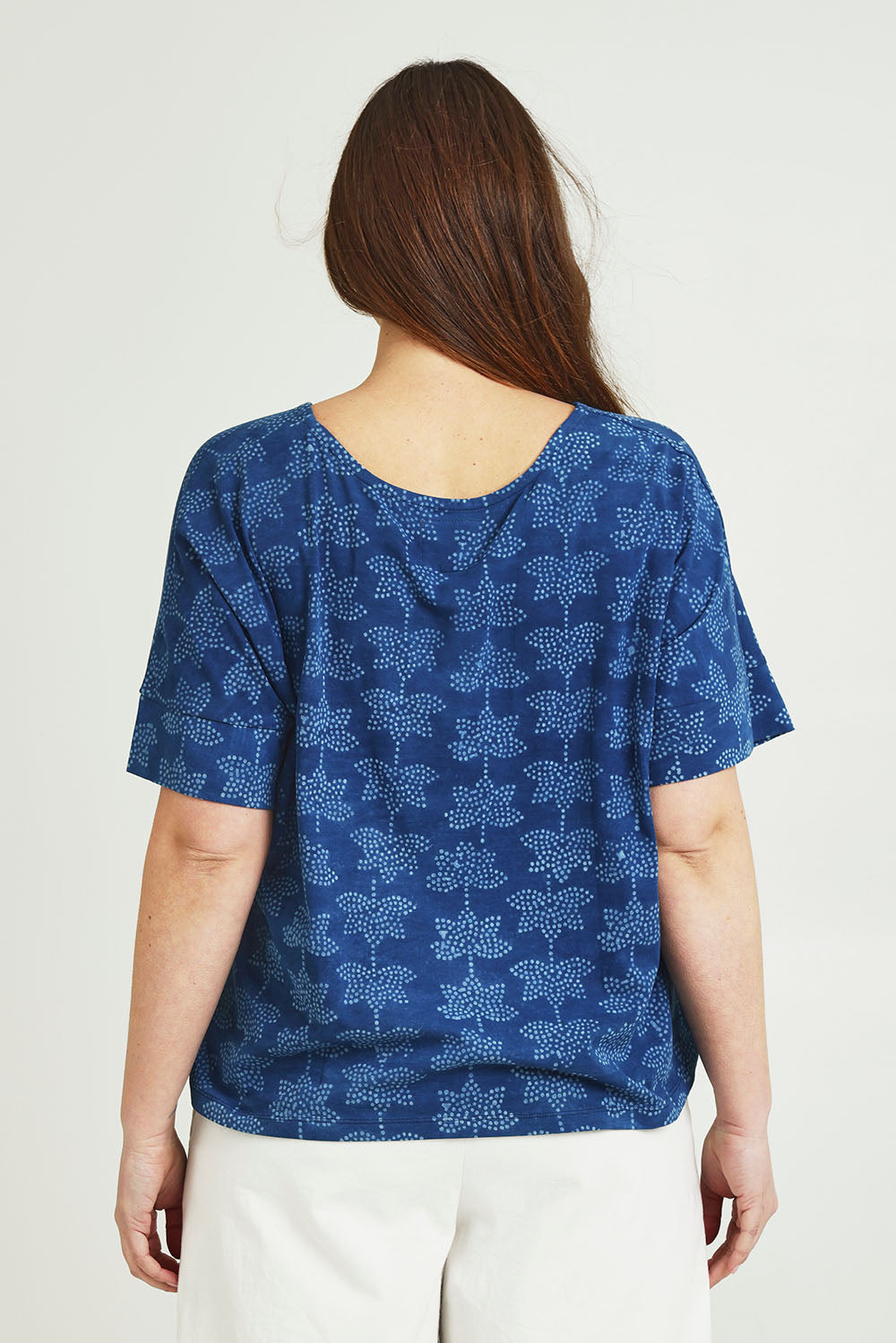 Model Jane wearing size 14 of the Sunday Funday Blockprint Tee in colour Indigo (Blue), from the back