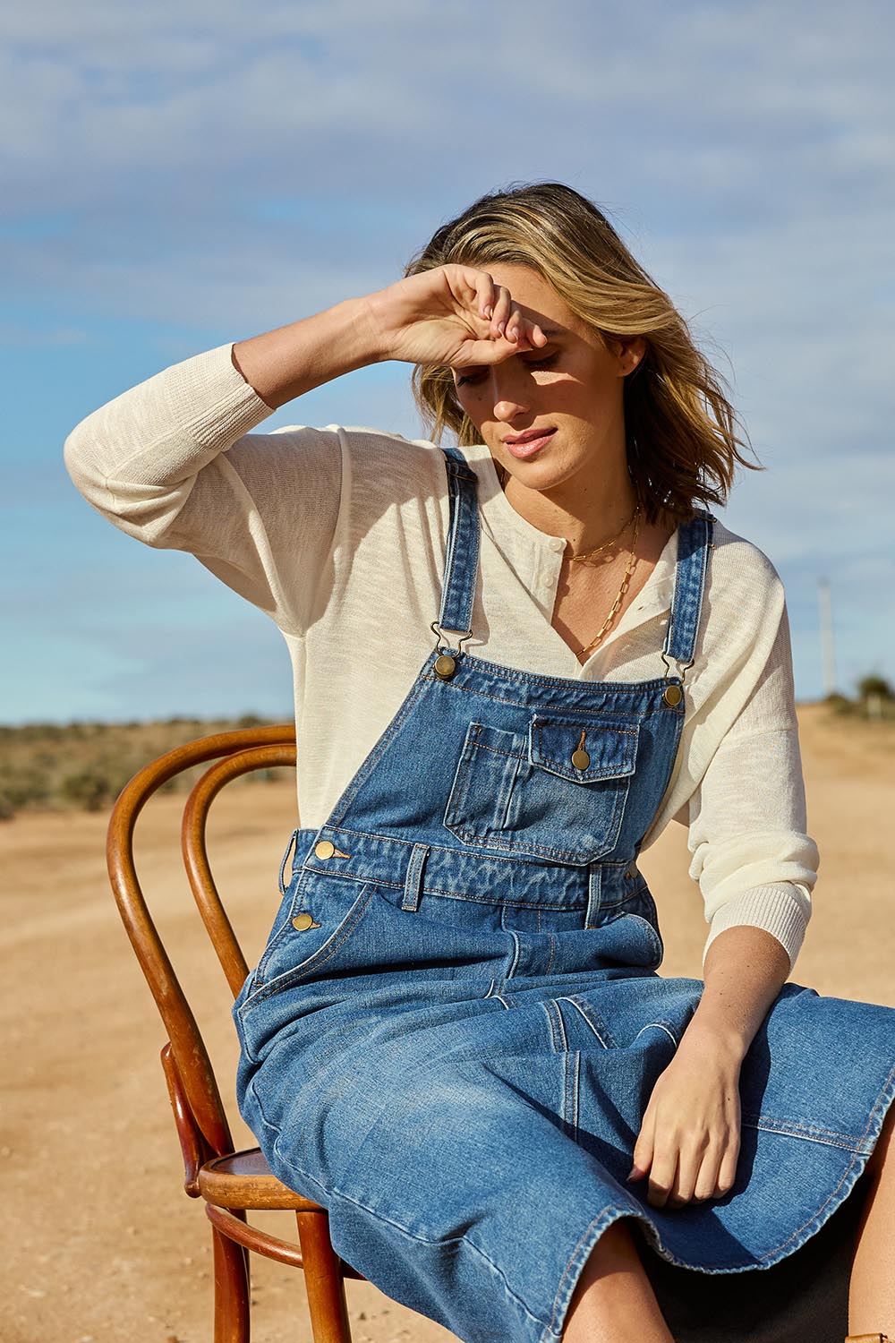 Model Tegan wearing the Go To Knit Boyfriend Henley in colour Natural, from the front, showing the whole outfit
