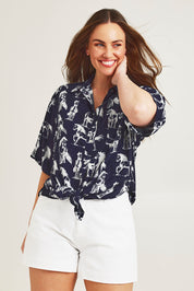 Model Jane wearing size 14 of the Too Good High Rise Denim Short in colour White (White), from the front, cropped image
