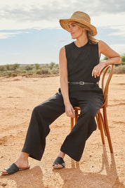 Model Tegan wearing size S of the Go To Knit Crew Tank in colour Black (Black), from the front, showing the whole outfit