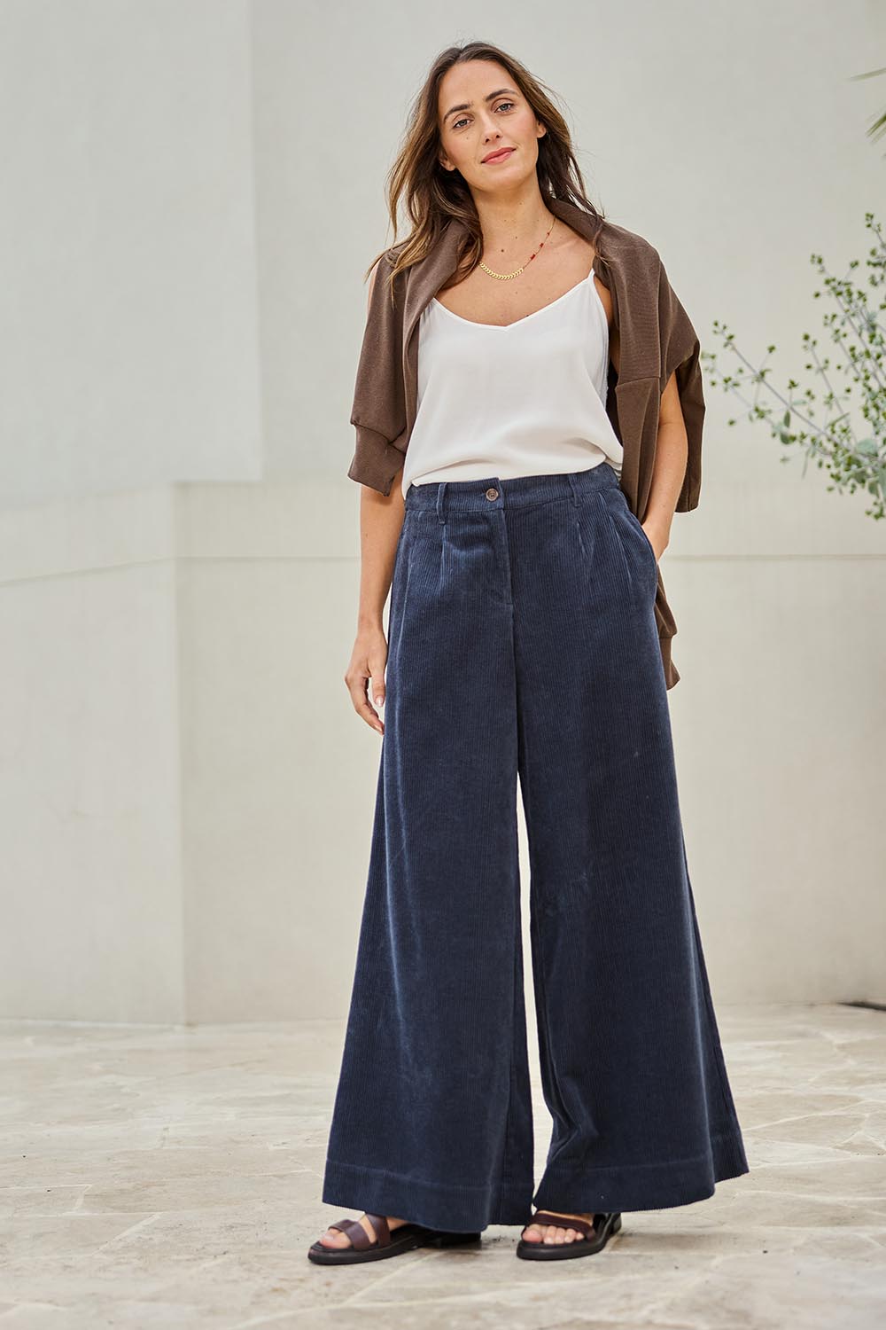 Model Tegand wearing size 10 of the Need You In My Life Cotton Cord Pants – Frenchnavy in colour Frenchnavy, from the front