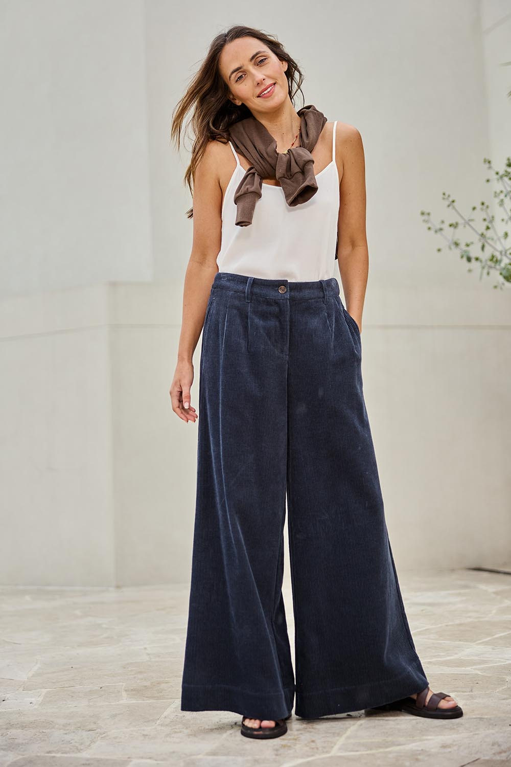 Model Tegand wearing size 10 of the Need You In My Life Cotton Cord Pants – Frenchnavy in colour Frenchnavy, from the front