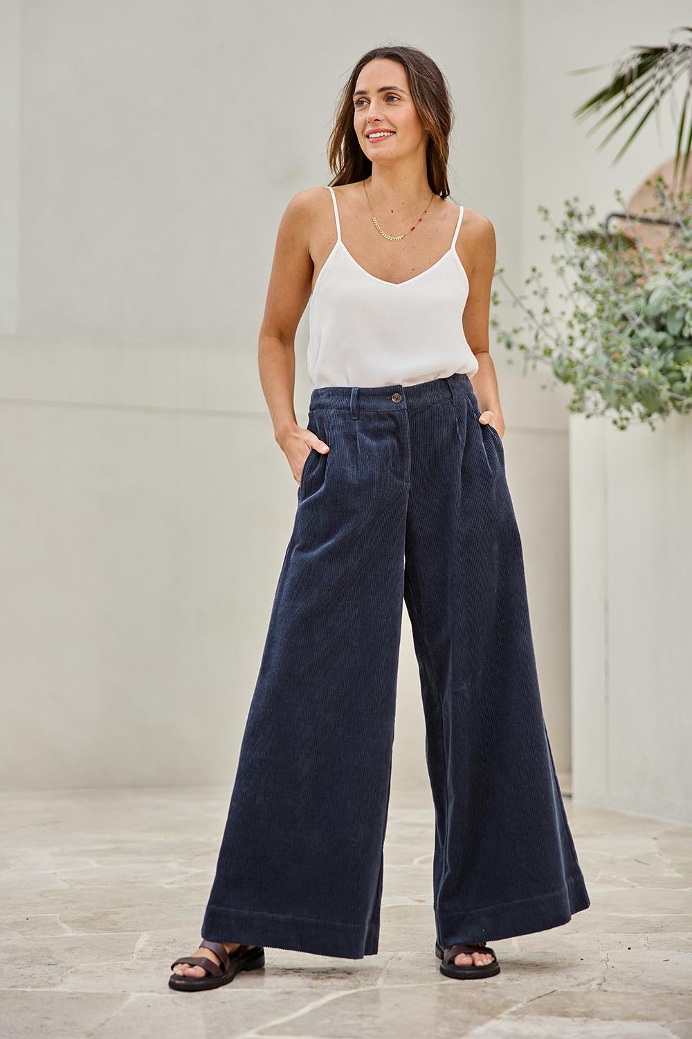 Model Tegand wearing size 10 of the Need You In My Life Cotton Cord Pants – Frenchnavy in colour Frenchnavy, from the front