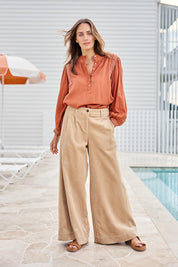 Model Tegand wearing size 10 of the Need You In My Life Cotton Cord Pants – Sand in colour Sand, from the front
