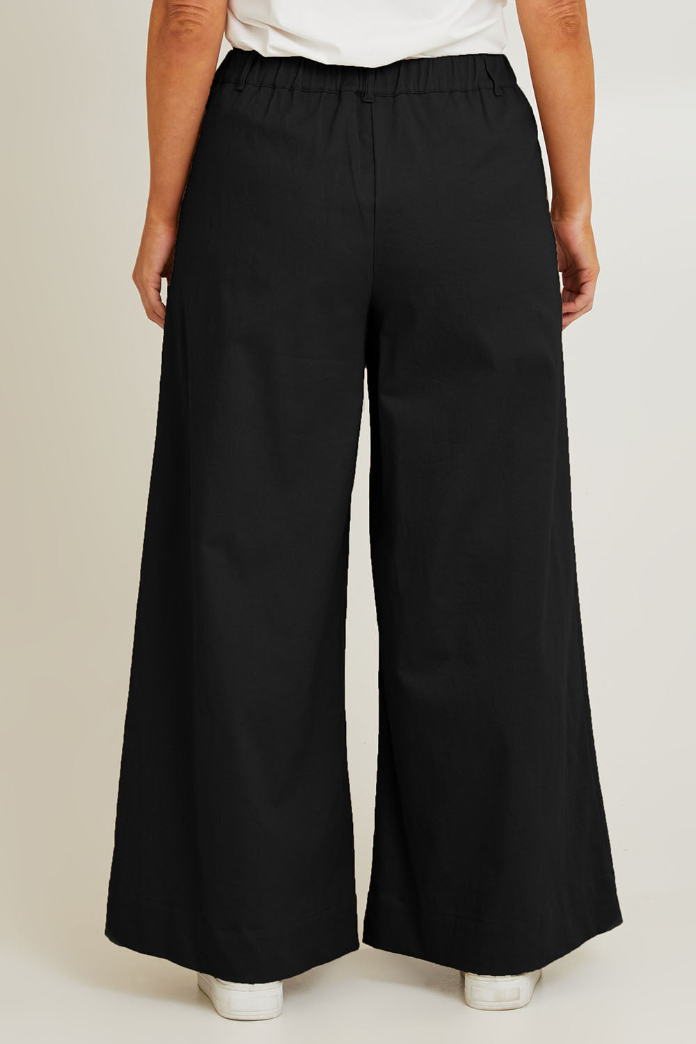 Model Laura wearing size 14 of the Need You In My Life Pants in colour Black (Black), from the back