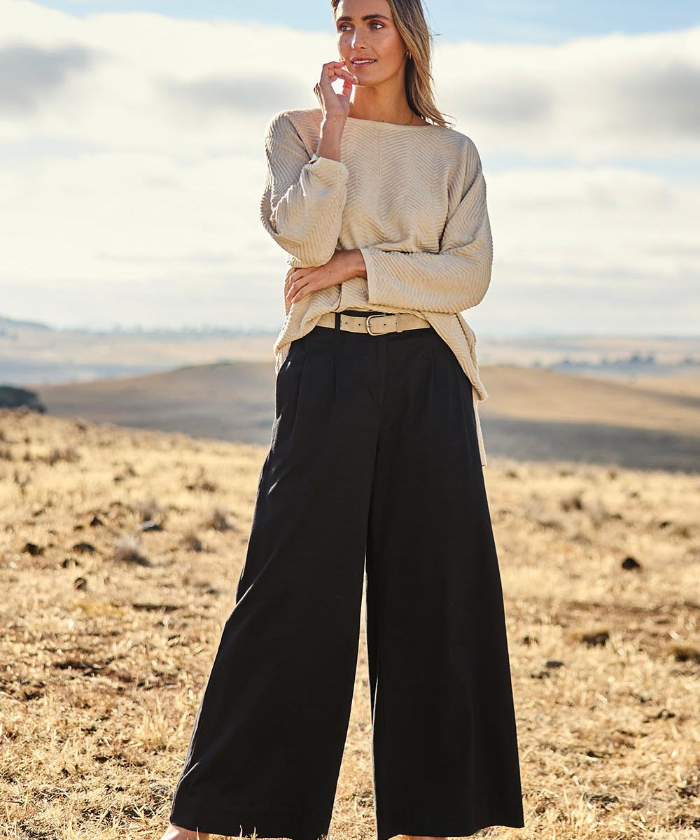 Model Tegan wearing size 10 of the Need You In My Life Pants in colour Black (Black), from the front, showing the whole outfit