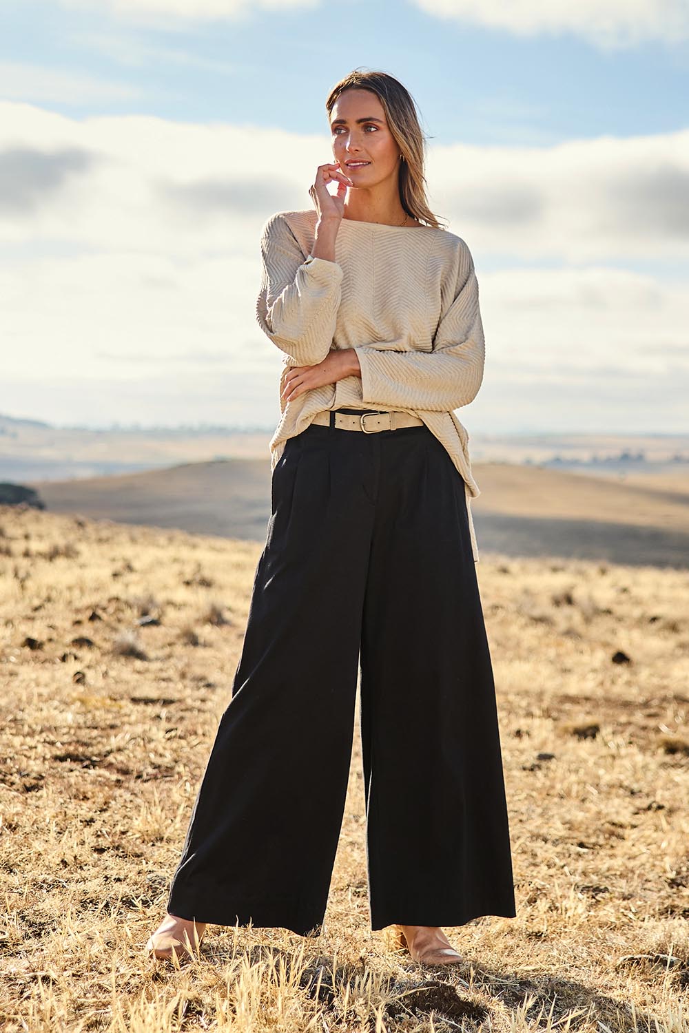 Model Tegan wearing size 10 of the Need You In My Life Pants in colour Black (Black), from the front, showing the whole outfit