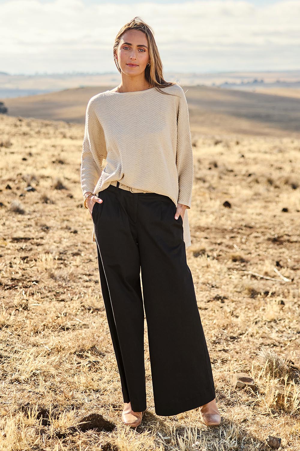 Model Tegan wearing size 10 of the Need You In My Life Pants in colour Black (Black), from the front, showing the whole outfit