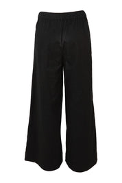 Product shot of the Need You In My Life Pants in colour Black (Black), from the back