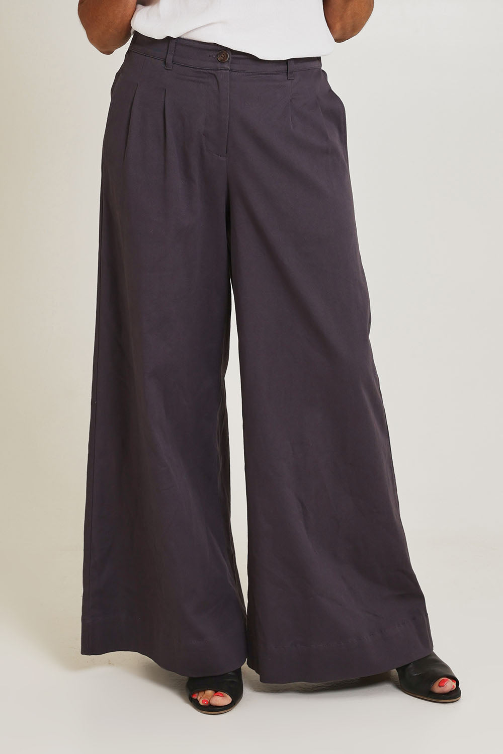 Model Sandy wearing size 10 of the Need You In My Life Pants in colour Steel (Grey), from the front, cropped image