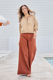 Model Tegand wearing size 10 of the Need You In My Life Pants – Tan in colour Tan, from the front