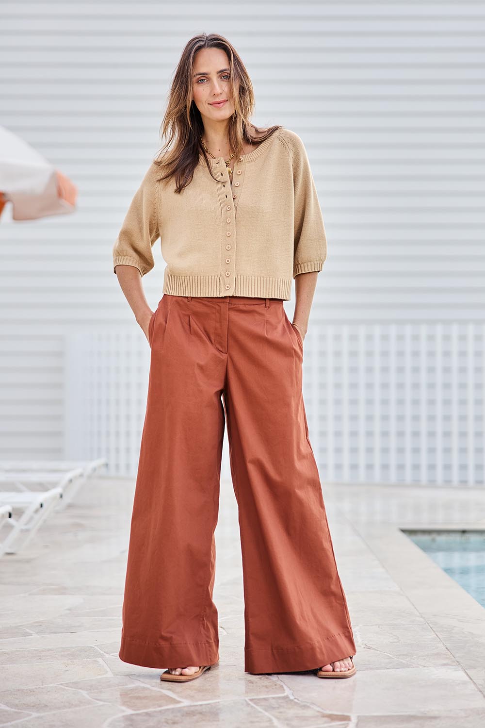 Model Tegand wearing size 10 of the Need You In My Life Pants – Tan in colour Tan, from the front