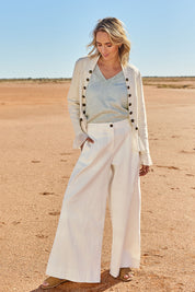 Model Tegan wearing size 10 of the Need You In My Life Pants in colour White (White), from the front, showing the whole outfit