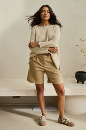 Model Tahnee wearing size 10 of the Need You In My Life Shorts in colour Sand, from the front, showing the whole outfit