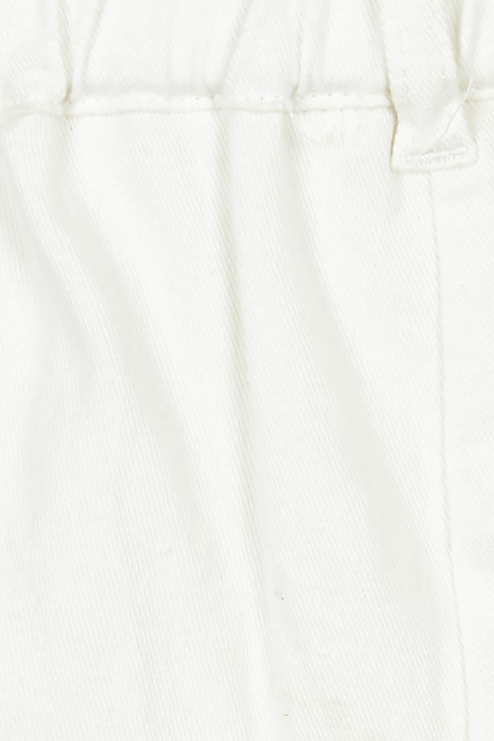 Product shot of the Need You In My Life Shorts in colour White (White), detail