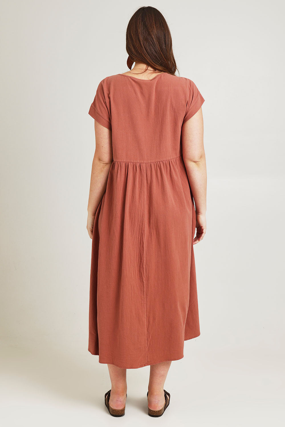 Model Jane wearing size 14 of the Free Falling Dress in colour Cinnamon, from the back