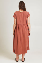 Model Jane wearing size 14 of the Free Falling Dress in colour Cinnamon, from the back