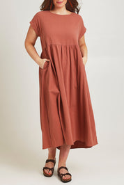 Model Jane wearing size 14 of the Free Falling Dress in colour Cinnamon, from the front, cropped image
