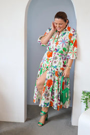 Model Stacey wearing size 14 of the Happy Gatherings Short Sleeved Cotton Dress in colour Brightbird, from the front, showing the whole outfit