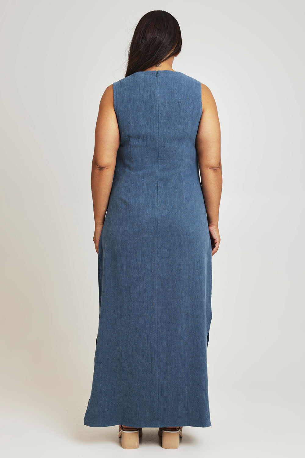 Model Ashleigh wearing size 16 of the Forever In Style Shift Dress in colour Denimblue (Blue), from the back