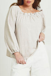 Model Jane wearing size 14 of the Shoulder Shimmy Linen Blouse in colour Natural, from the front, cropped image