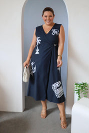 Model Stacey wearing size 14 of the By The Seaside Embroidered Cotton Jumpsuit in colour Navy (Blue), from the front, showing the whole outfit