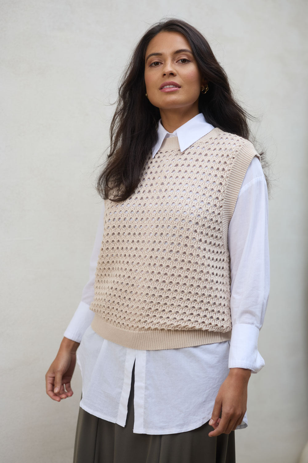 Model Tahnee wearing size S of the Love Language Cotton Vest in colour Natural, from the front, showing the whole outfit